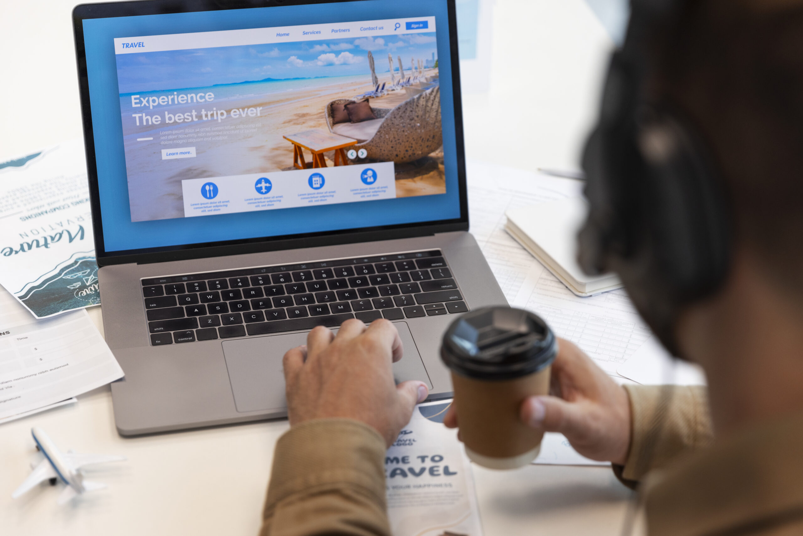 high angle man working travel agency scaled